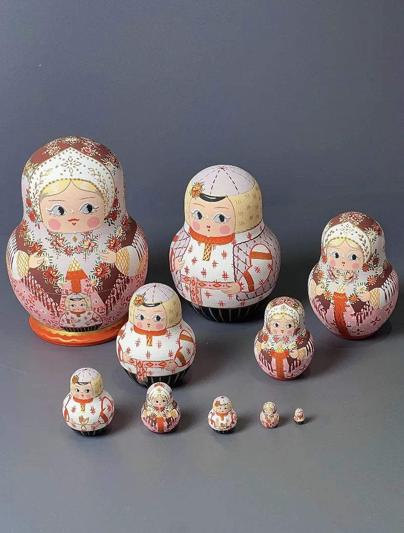 A set of colorful Matryoshka dolls, beautifully hand-painted, symbolizing family and unity.