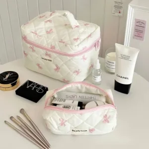 Compact travel toiletry bag with multiple compartments, designed for convenience and style.